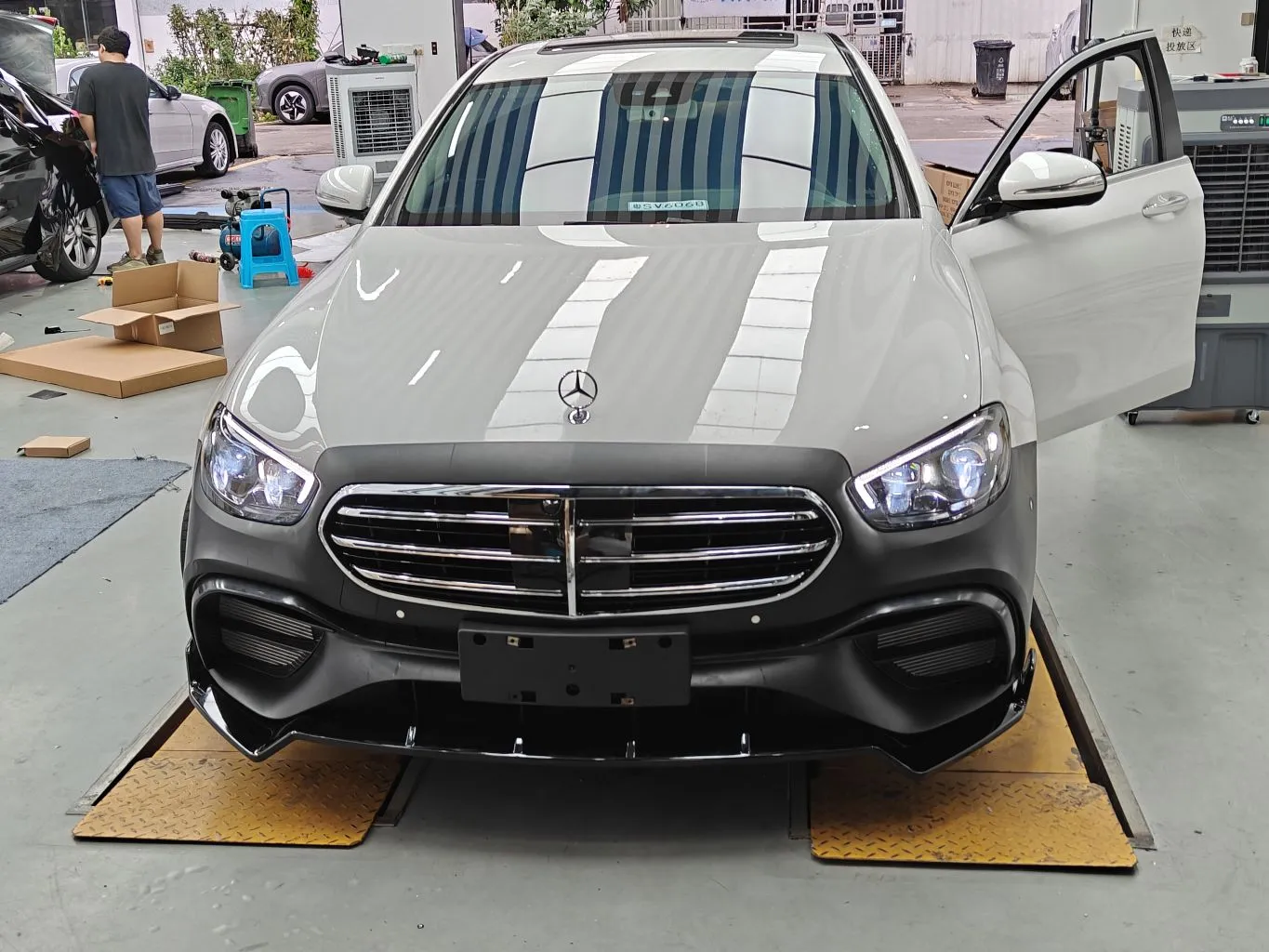 For 2016–2020 Mercedes-Benz E-Class (W213 Pre-Facelift) Old-to-New 2023 Model Standing Emblem E63-Style Body Kit